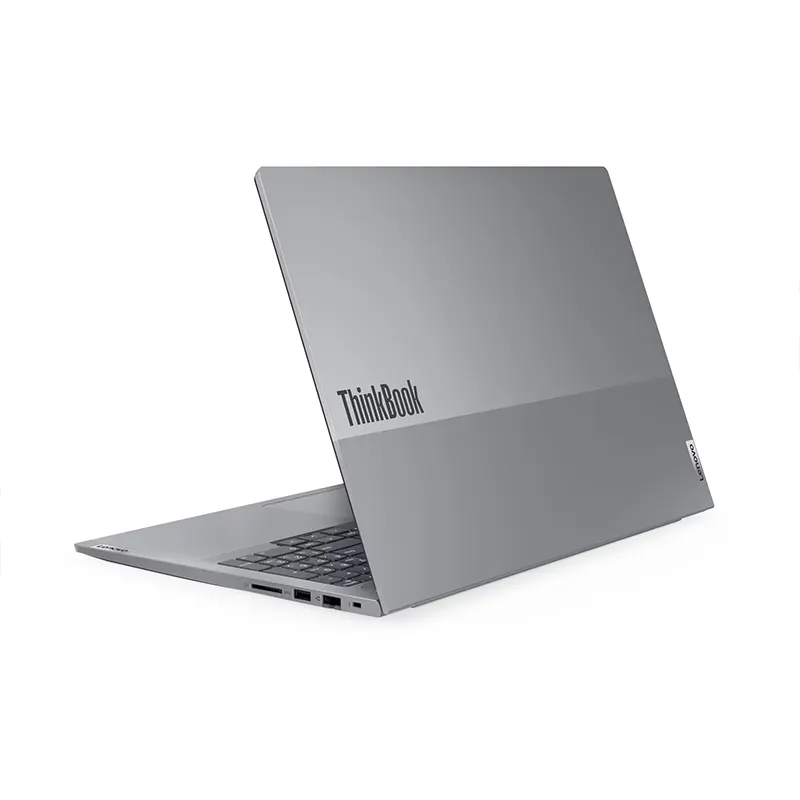 Silver Lenovo ThinkBook laptop angled to show keyboard and ports, featuring a sleek design with "ThinkBook" logo prominently displayed.